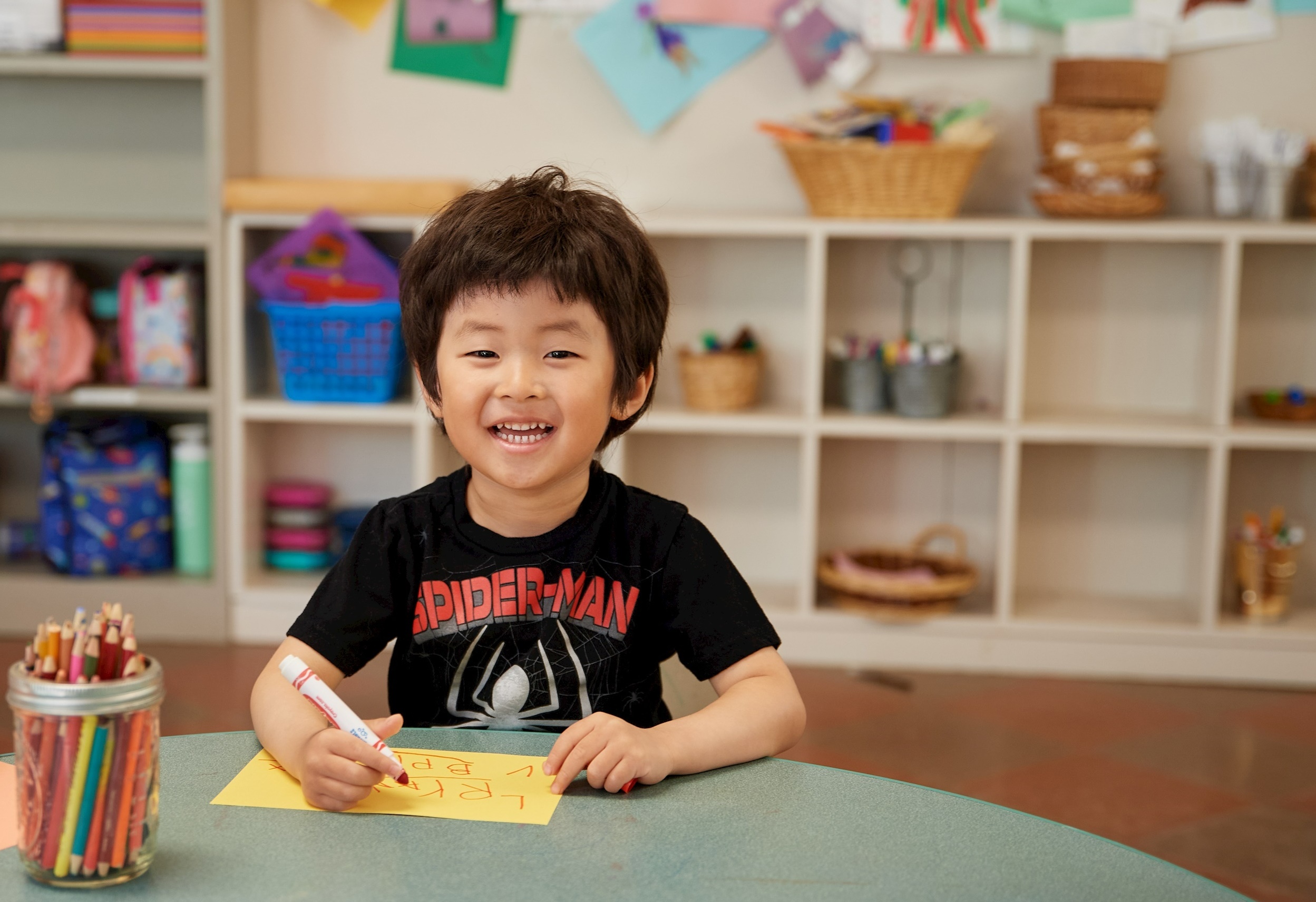 photo of boy drawing